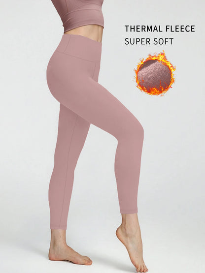 Thermal leggings for women featuring fleece lining and high waist design. Perfect for winter running and outdoor workout comfort